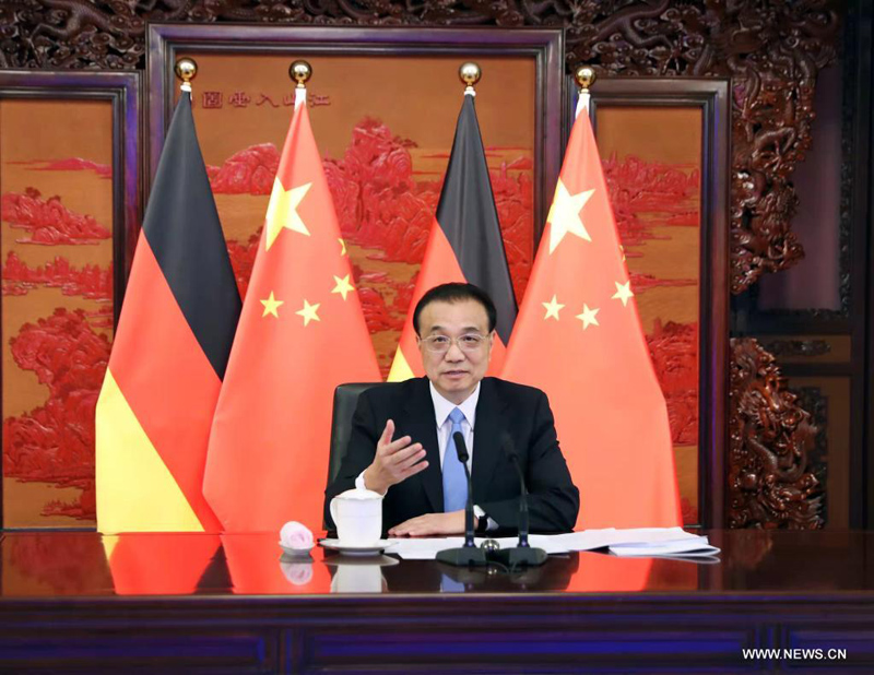رئيس مجلس الدولة الصيني يلتقي ميركل عبر رابط فيديو