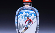 الرسم داخل الزجاجة .. فكرة فنية للترحيب بالالعاب الأولمبية الشتوية