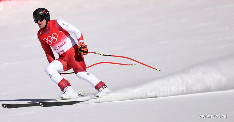 النمساوي الحاصل على الميدالية الذهبية ماتياس ماير يتنافس خلال مسابقات سوبر - جي للتزلج الألبي رجال