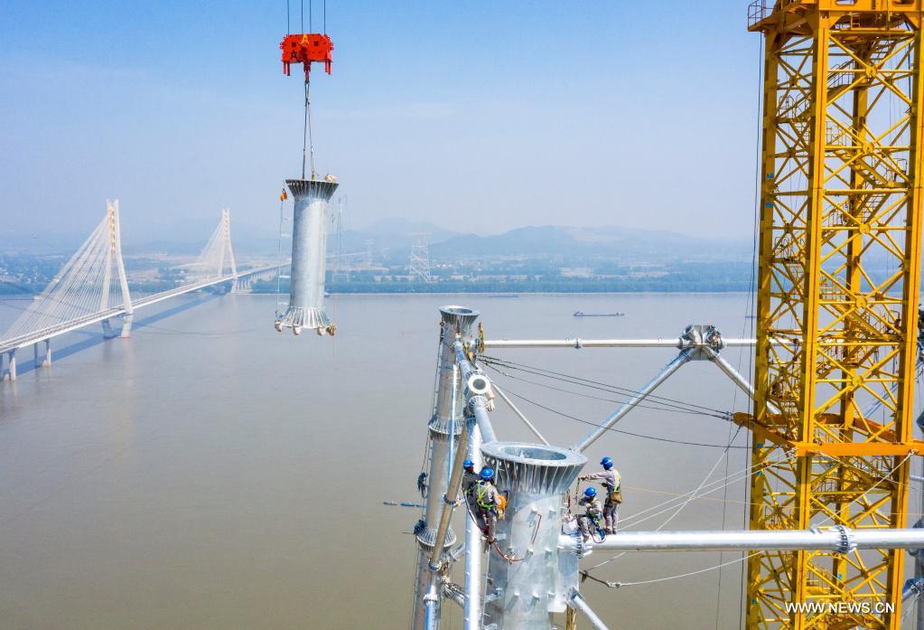 تسريع إنشاء مشروع لنقل الطاقة الكهربائية فائقة الجهد على أكبر نهر في الصين