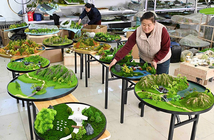 طاولات الرمل في بينغشان، حرفة تقليدية تزدهر من جديد بفضل التكنولوجيا