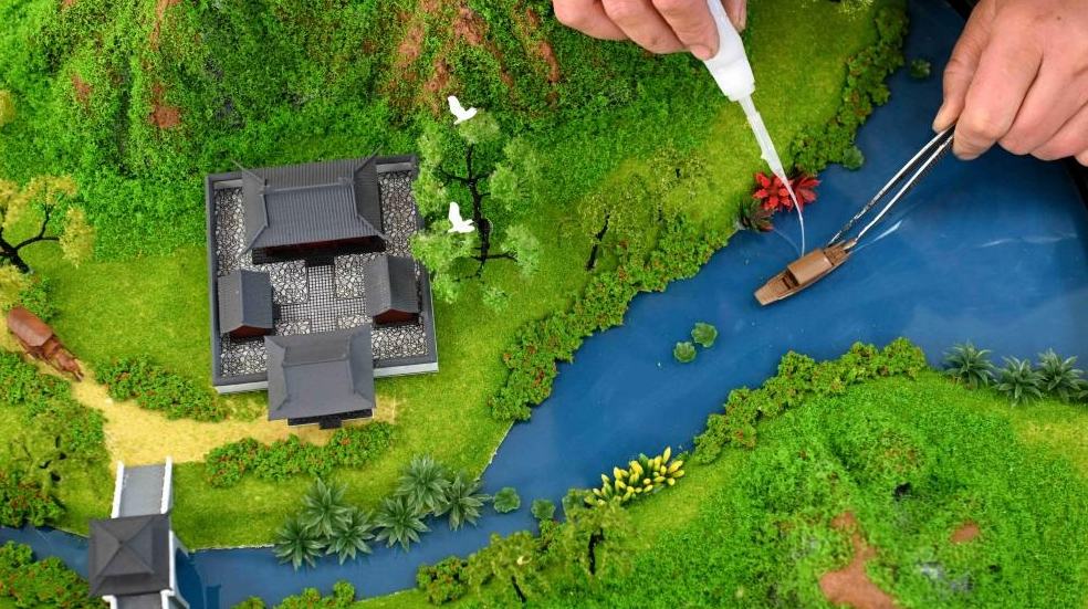 طاولات الرمل في بينغشان، حرفة تقليدية تزدهر من جديد بفضل التكنولوجيا