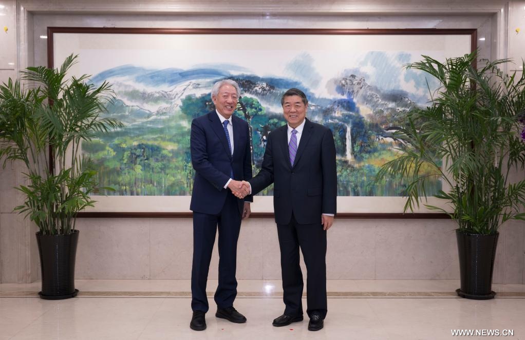 مسؤول صيني رفيع المستوى يلتقي برئيس شركة "تيماسيك" السنغافورية